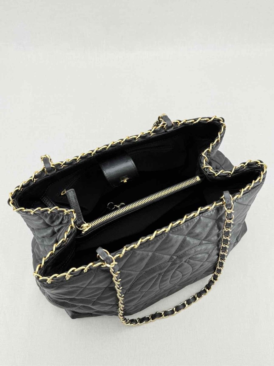 Pre - loved CHANEL Chain Me Black Quilted Tote Bag at Reems Closet