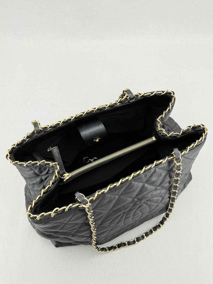 Pre - loved CHANEL Chain Me Black Quilted Tote Bag at Reems Closet