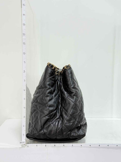 Pre - loved CHANEL Chain Me Black Quilted Tote Bag at Reems Closet