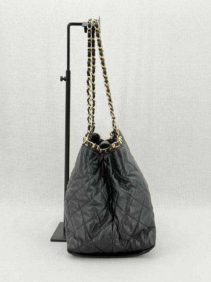 Pre - loved CHANEL Chain Me Black Quilted Tote Bag at Reems Closet