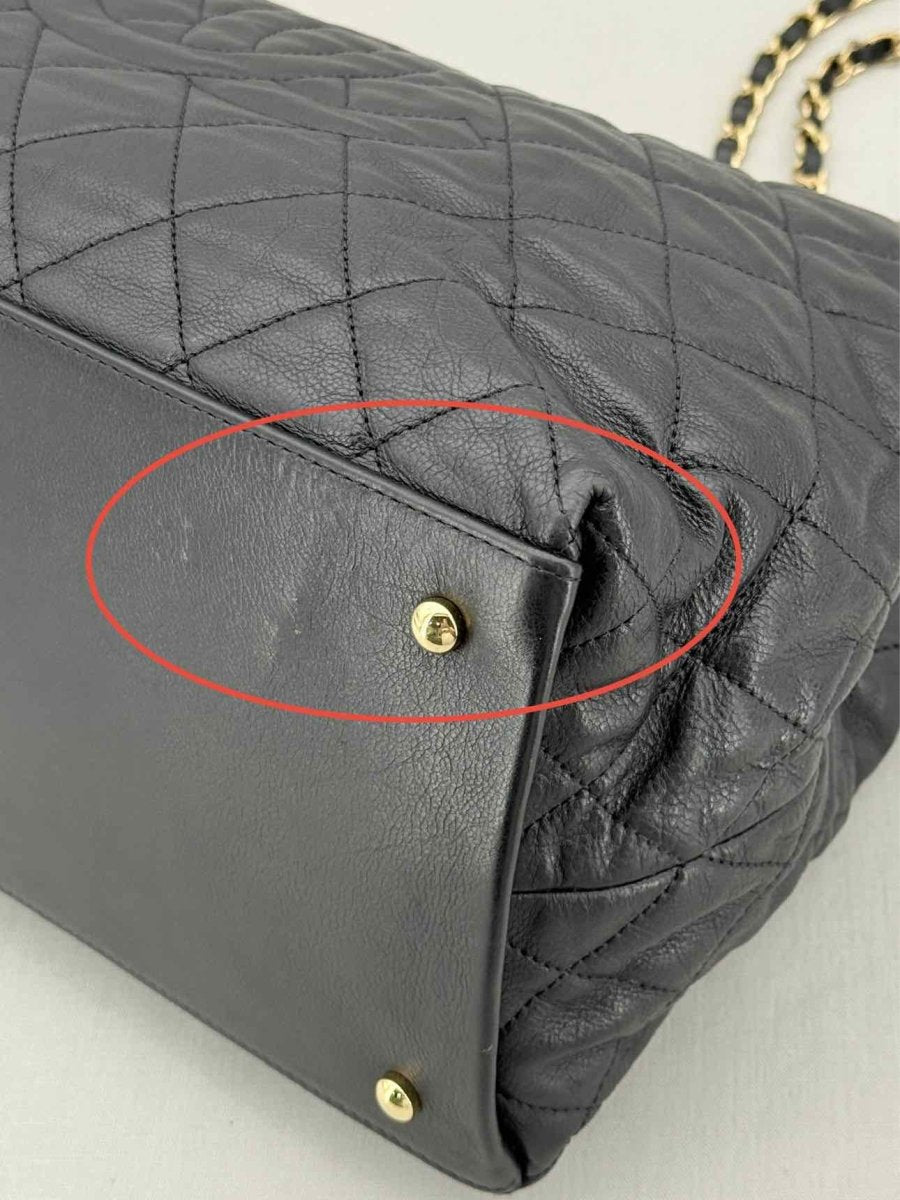 Pre - loved CHANEL Chain Me Black Quilted Tote Bag at Reems Closet