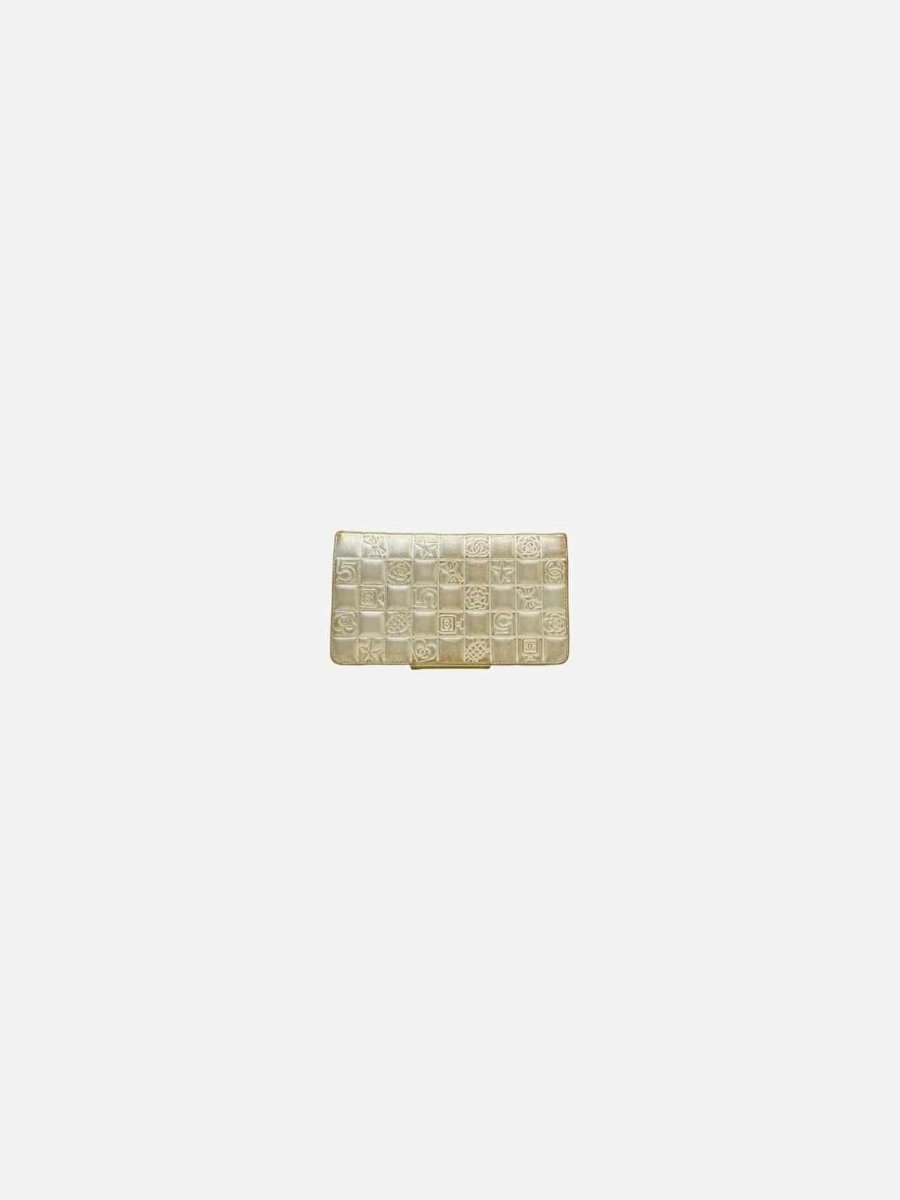 Pre - loved CHANEL Chocolate Bar Gold Embossed Continental Wallet at Reems Closet