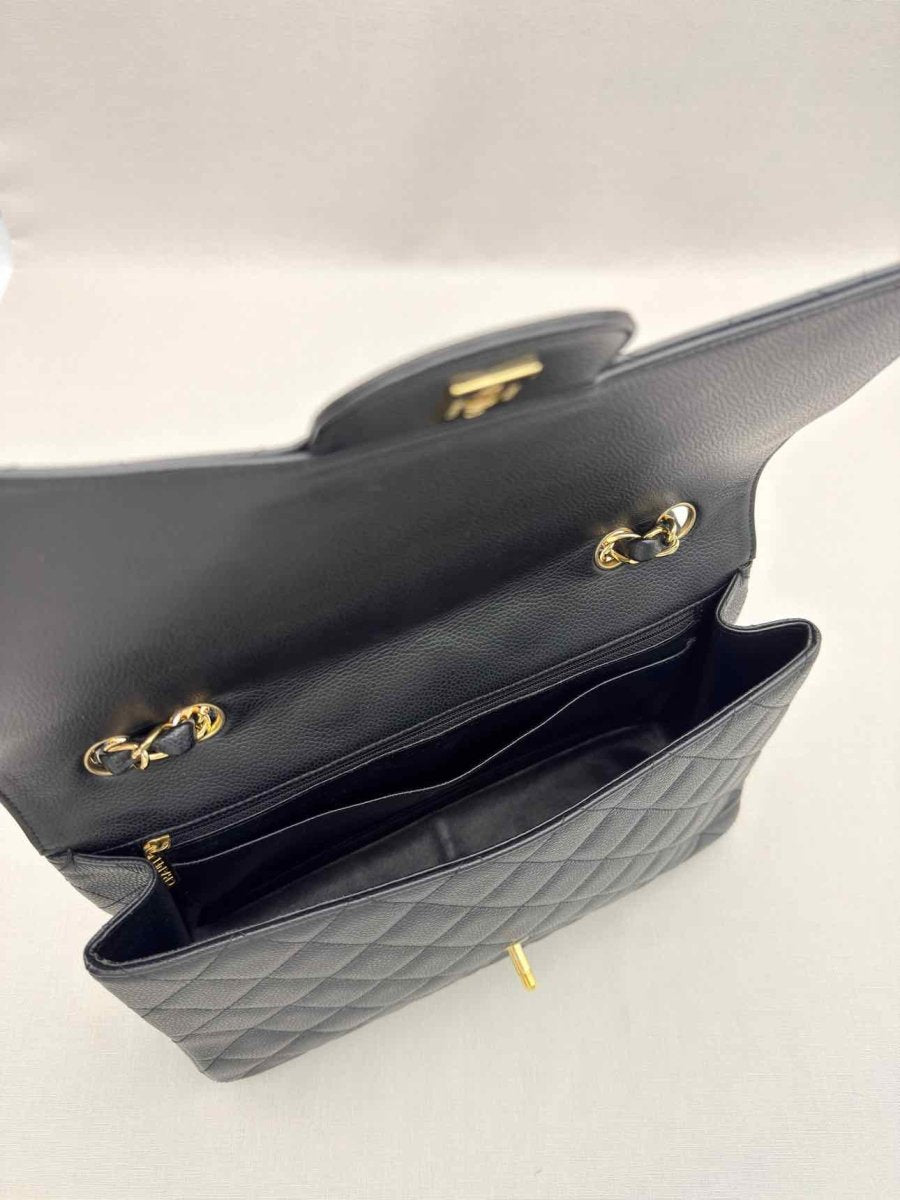 Pre-loved CHANEL Classic Black Quilted Shoulder Bag at Reems Closet
