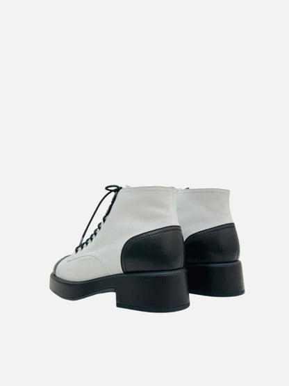 Pre - loved CHANEL Combat White w/ Black CC Ankle Boots 39.5 at Reems Closet