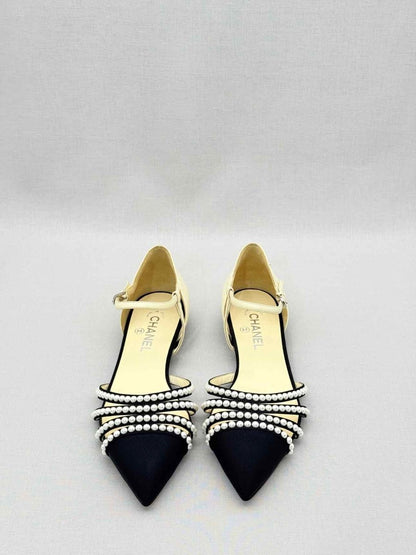 Pre-loved CHANEL Cream & Black Size EU 40.5 Flats at Reems Closet