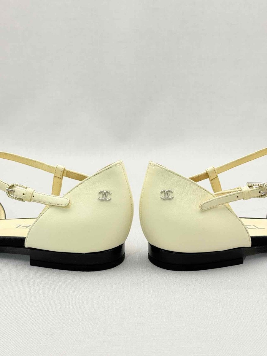 Pre-loved CHANEL Cream & Black Size EU 40.5 Flats at Reems Closet