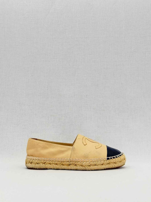 Pre - loved CHANEL Escapade Beige w/ Black Size EU 38 Flat Shoes at Reems Closet