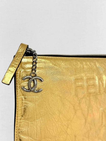 Pre - loved CHANEL Feministe Mais Feminine Gold Clutch at Reems Closet