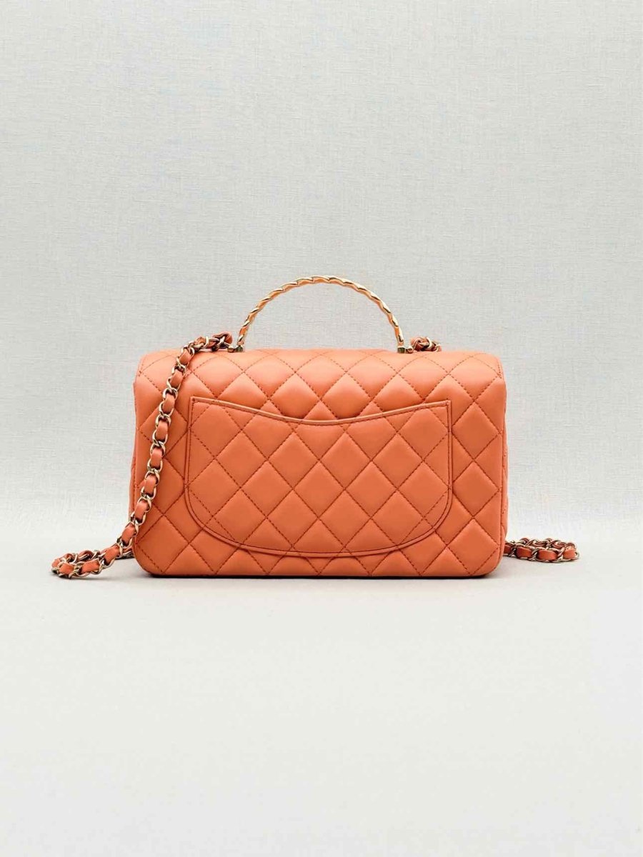 Pre - loved CHANEL Flap Coral Quilted Top Handle at Reems Closet
