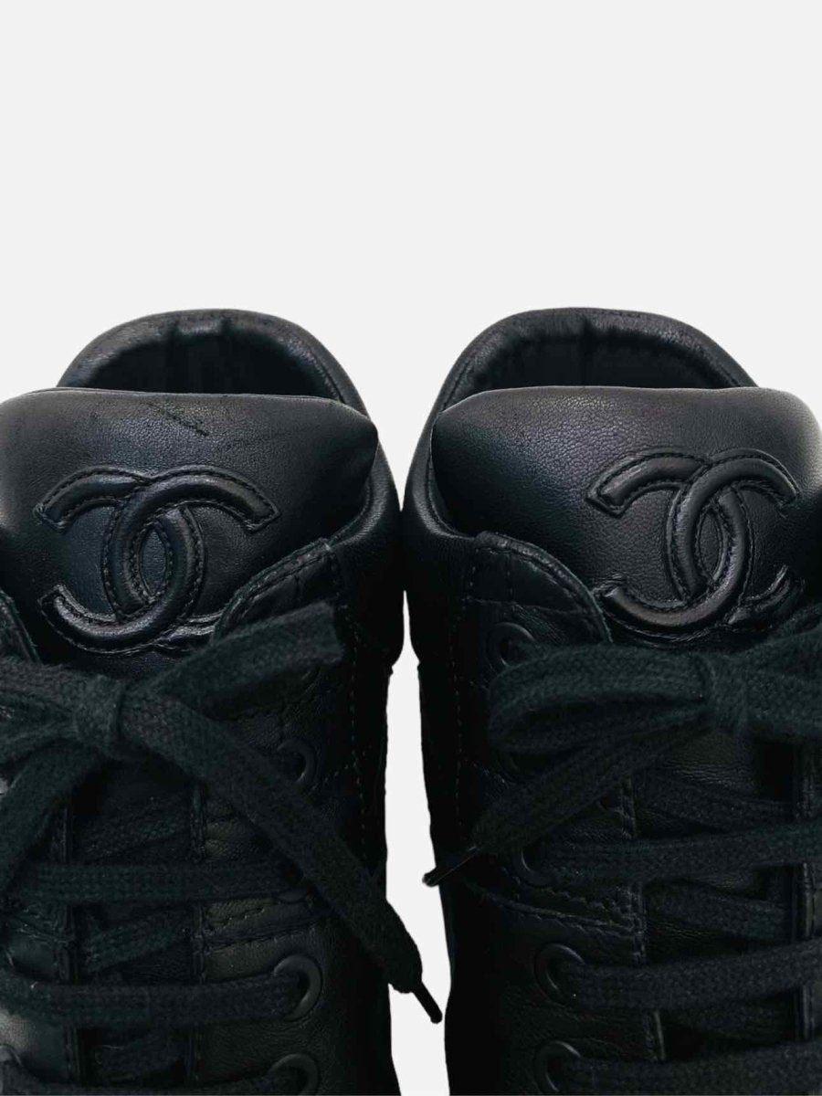 Pre - loved CHANEL High Top Black Quilted Sneakers 35.5 at Reems Closet