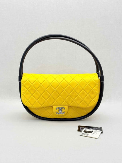 Pre-loved CHANEL Hula Hoop Yellow & Black Quilted Shoulder Bag at Reems Closet
