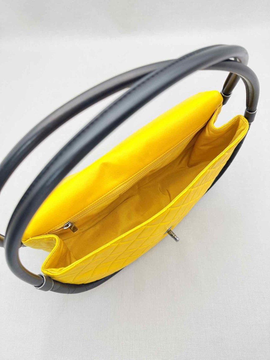 Pre-loved CHANEL Hula Hoop Yellow & Black Quilted Shoulder Bag at Reems Closet