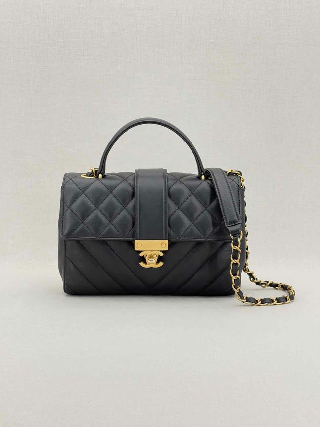 Pre - loved CHANEL In The City Black Quilted Top Handle at Reems Closet