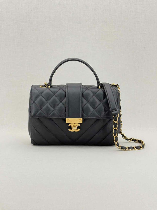 Pre - loved CHANEL In The City Black Quilted Top Handle at Reems Closet