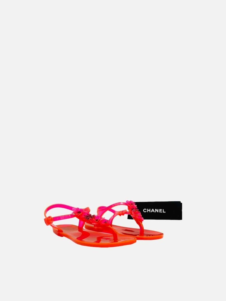 Pre - loved CHANEL Jelly Orange Sandals 37 at Reems Closet