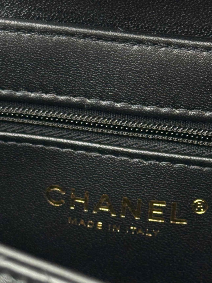 Pre - loved CHANEL Kelly Black Quilted Top Handle at Reems Closet