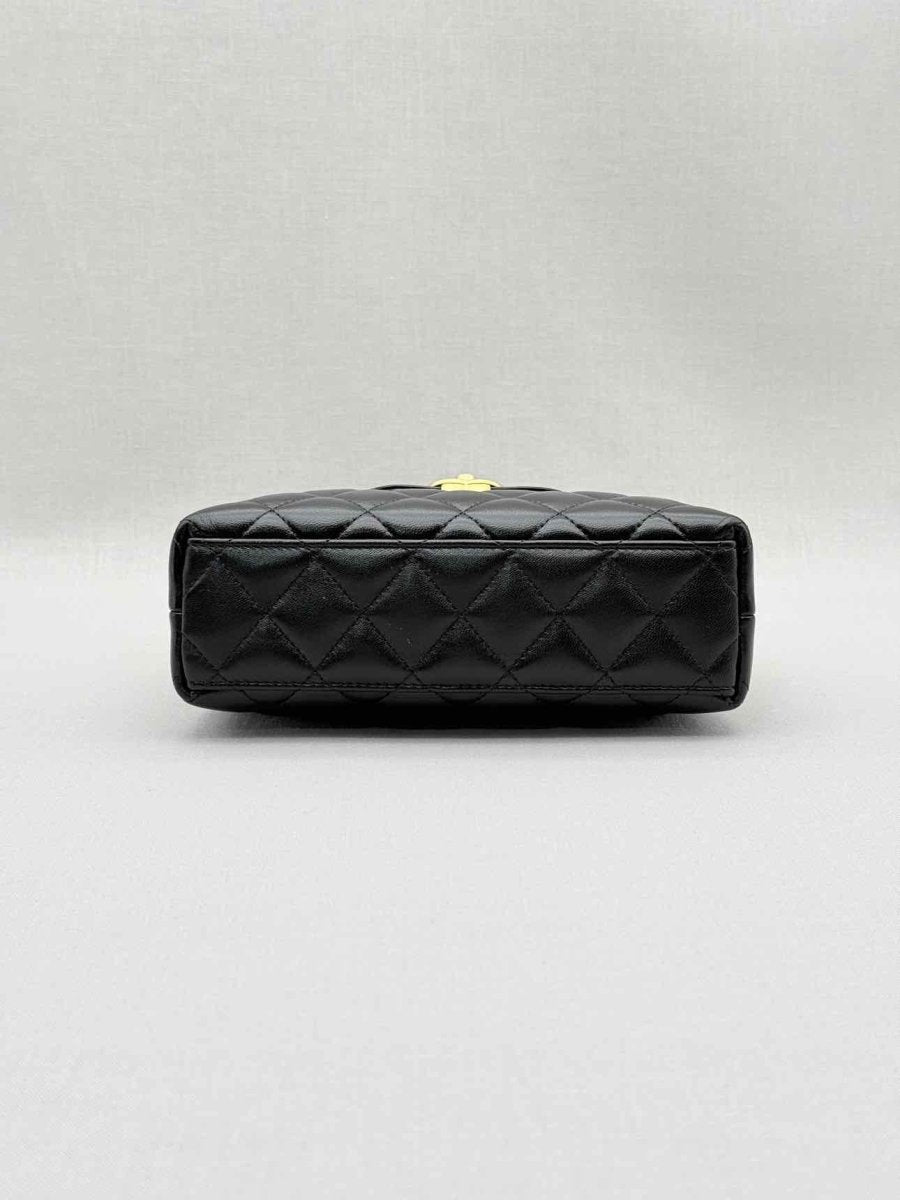 Pre - loved CHANEL Kelly Black Quilted Top Handle at Reems Closet