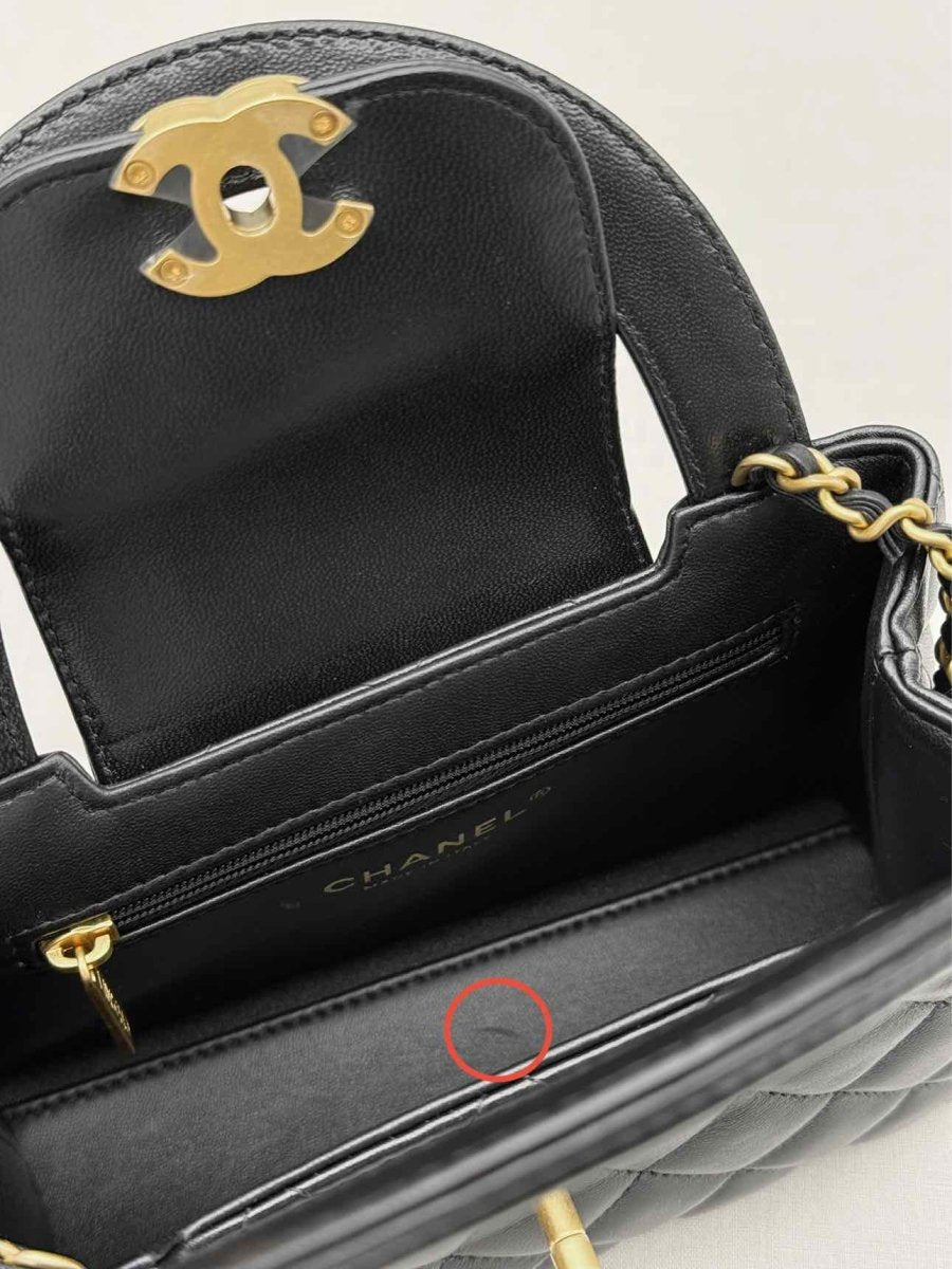 Pre - loved CHANEL Kelly Black Quilted Top Handle at Reems Closet