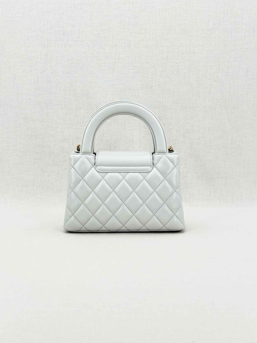 Pre - loved CHANEL Kelly Grey Quilted Top Handle at Reems Closet