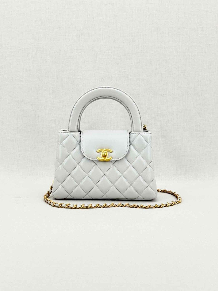 Pre - loved CHANEL Kelly Grey Quilted Top Handle at Reems Closet