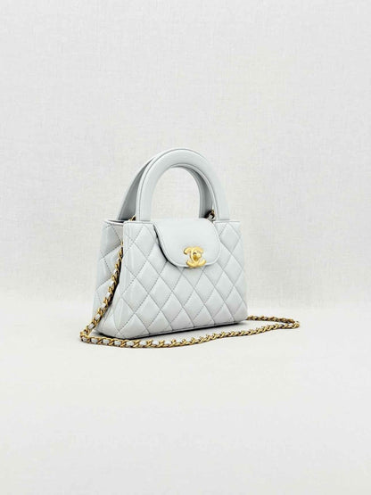 Pre - loved CHANEL Kelly Grey Quilted Top Handle at Reems Closet