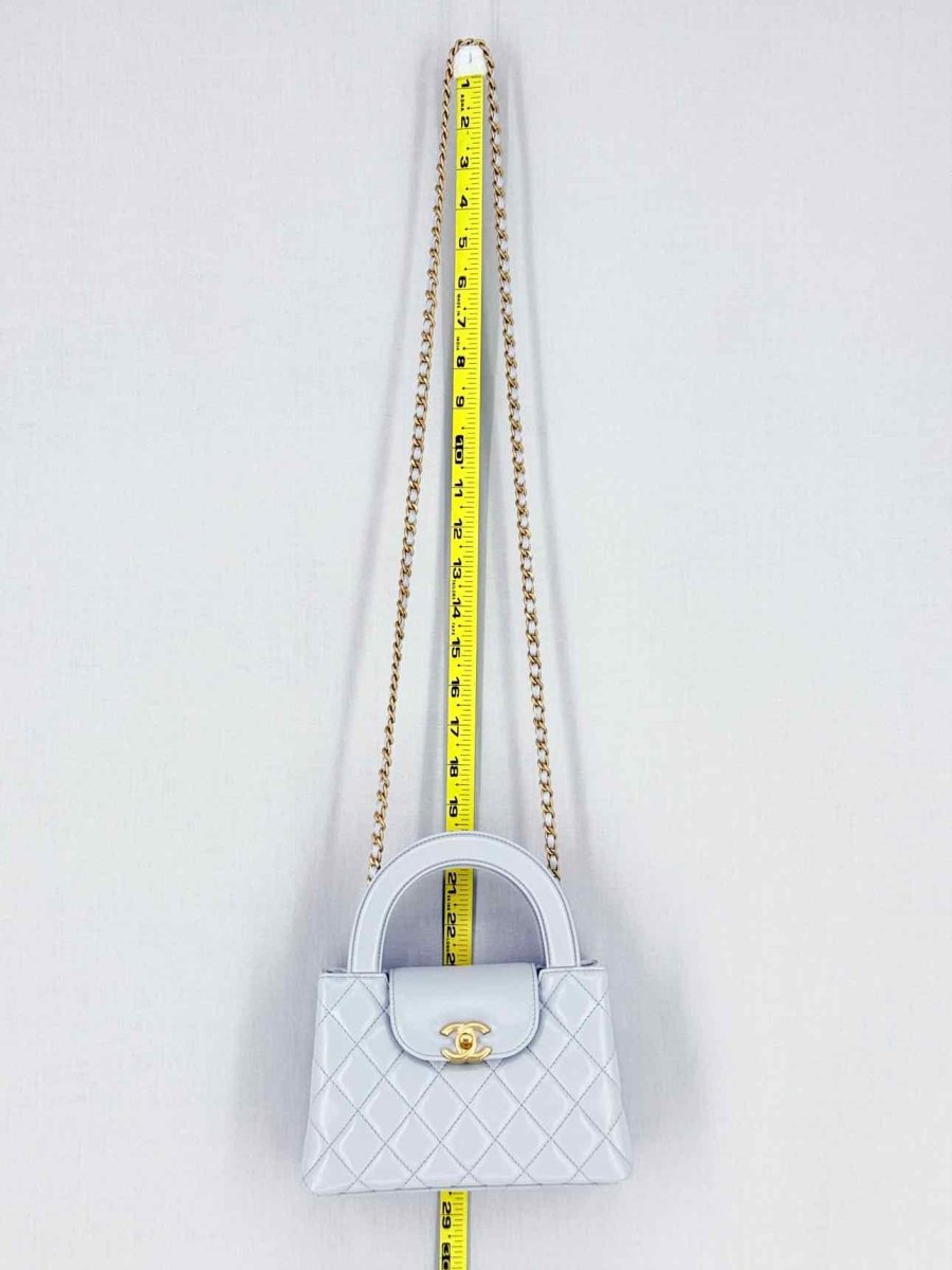 Pre - loved CHANEL Kelly Grey Quilted Top Handle at Reems Closet