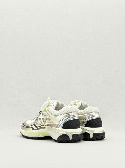 Pre - loved CHANEL Metallic Silver & Gold Size EU 35.5 Sneakers at Reems Closet