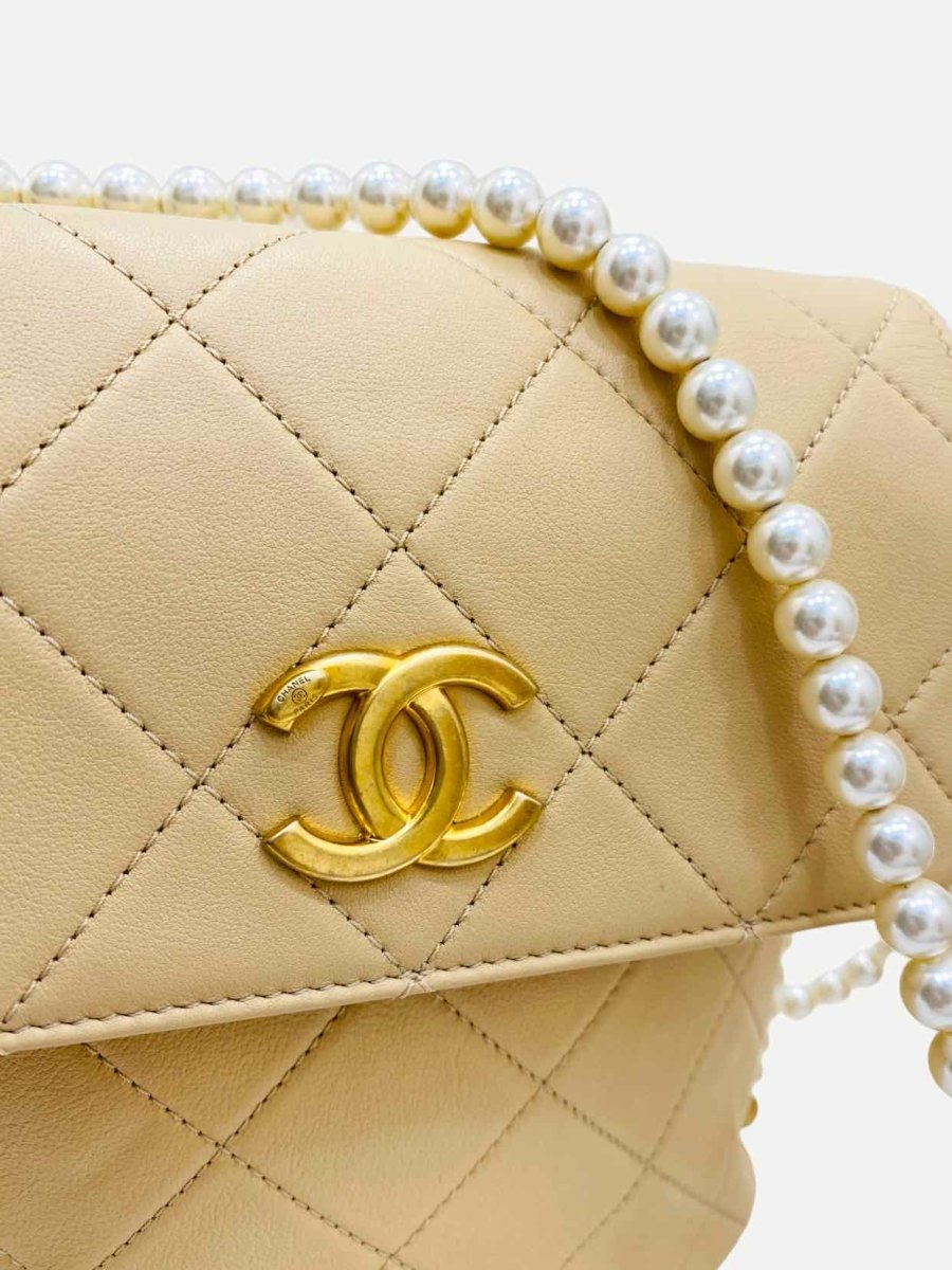 Pre - loved CHANEL Pearl Chain Flap Beige Quilted Crossbody at Reems Closet