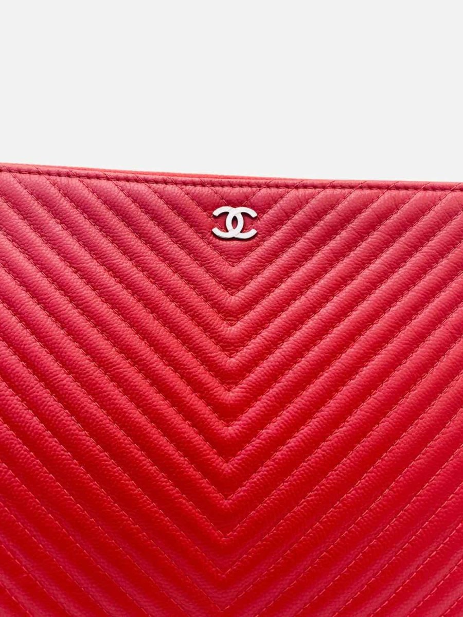 Pre - loved CHANEL Red Chevron Clutch at Reems Closet