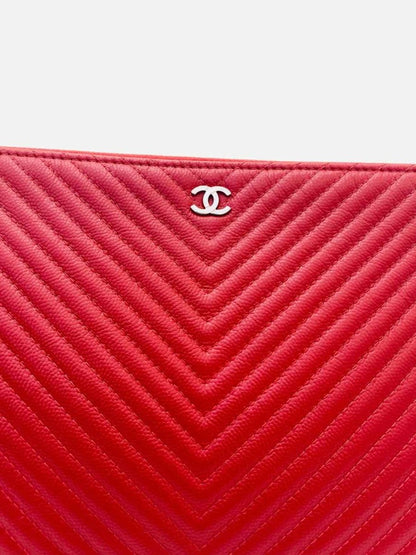 Pre - loved CHANEL Red Chevron Clutch at Reems Closet