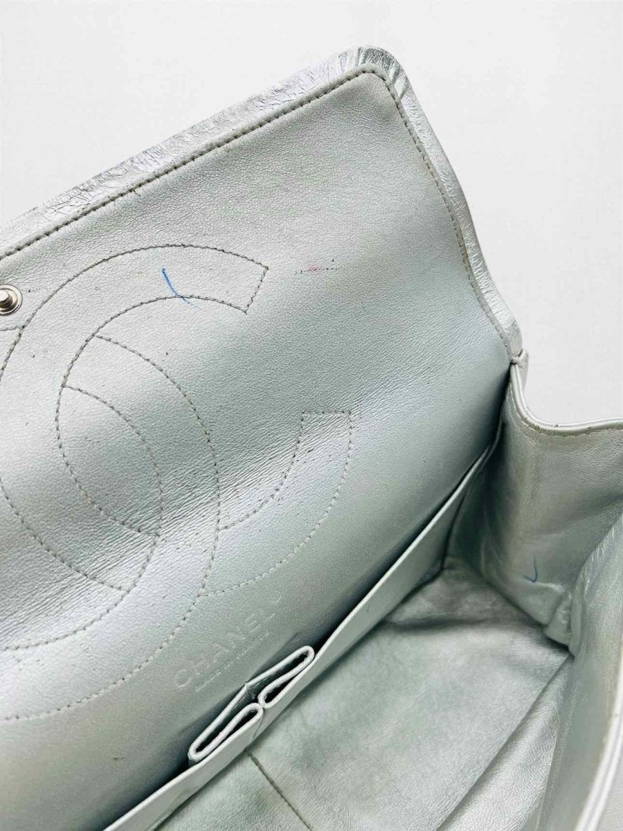 Pre-loved CHANEL Reissue 2.55 Silver Quilted Shoulder Bag at Reems Closet