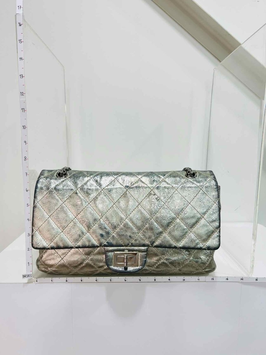 Pre-loved CHANEL Reissue 2.55 Silver Quilted Shoulder Bag at Reems Closet