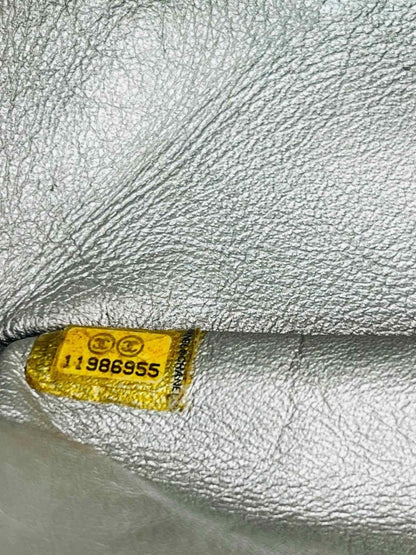 Pre-loved CHANEL Reissue 2.55 Silver Quilted Shoulder Bag at Reems Closet