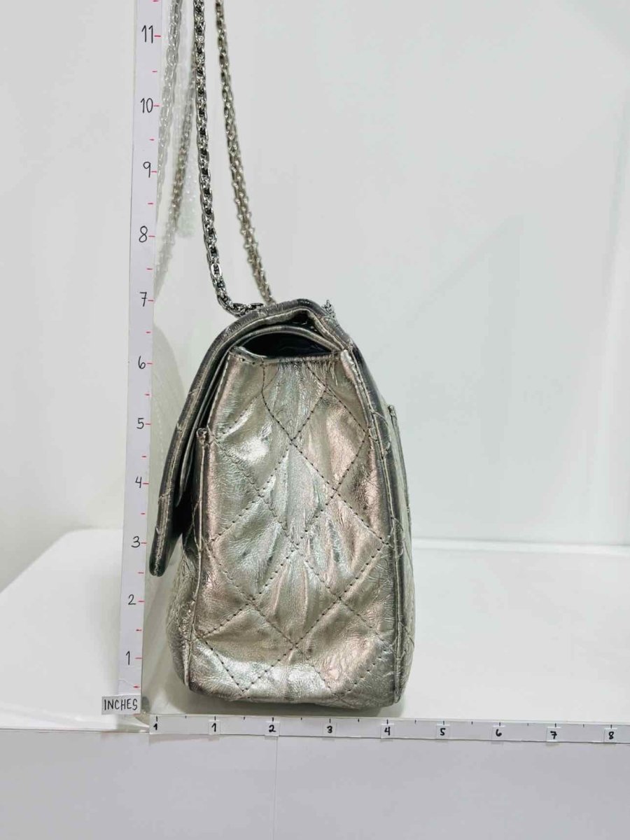 Pre-loved CHANEL Reissue 2.55 Silver Quilted Shoulder Bag at Reems Closet