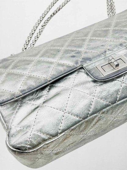 Pre-loved CHANEL Reissue 2.55 Silver Quilted Shoulder Bag at Reems Closet