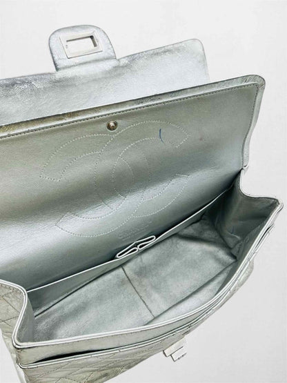 Pre-loved CHANEL Reissue 2.55 Silver Quilted Shoulder Bag at Reems Closet