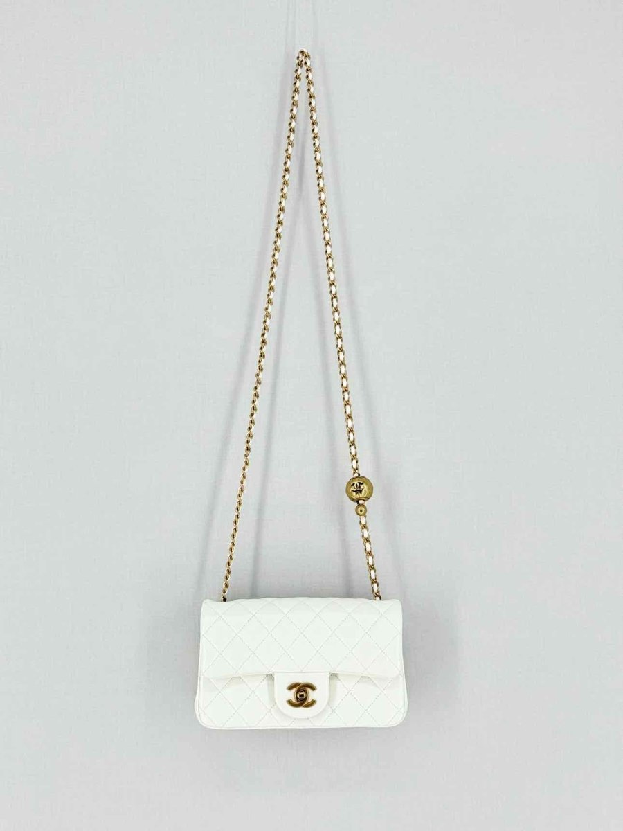 Pre - loved CHANEL Runaway White Quilted Shoulder Bag at Reems Closet