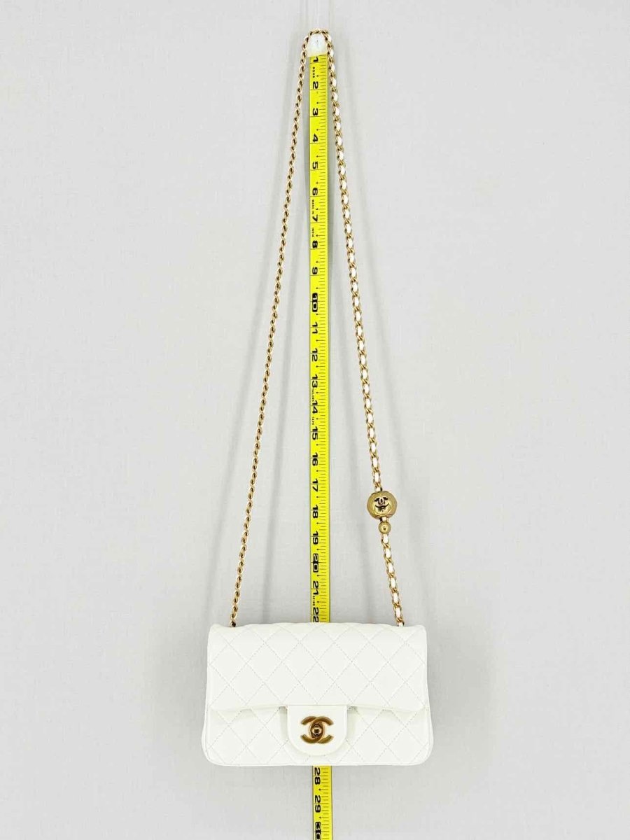 Pre - loved CHANEL Runaway White Quilted Shoulder Bag at Reems Closet