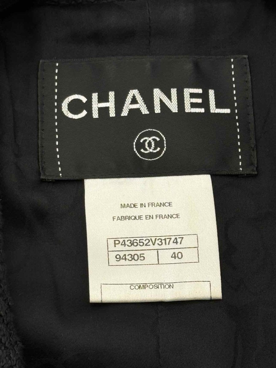 Pre - loved CHANEL Short Boxy Tweed Black Size US 8 Jacket at Reems Closet