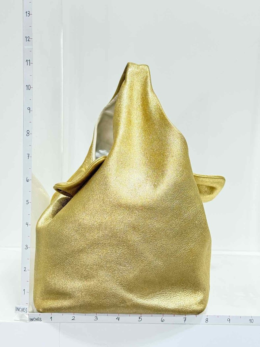 Pre - loved CHANEL Slouchy Metallic Gold Top Handle at Reems Closet
