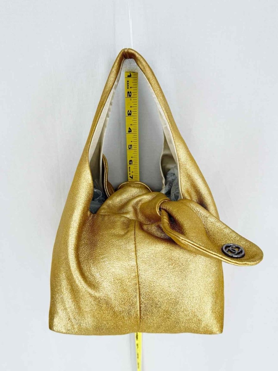 Pre - loved CHANEL Slouchy Metallic Gold Top Handle at Reems Closet