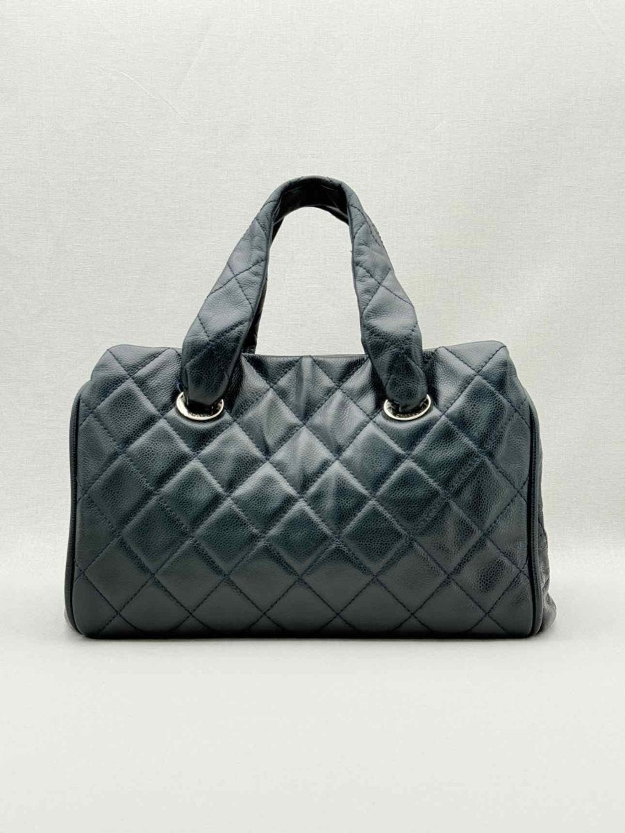 Pre - loved CHANEL Timeless Black Quilted Bowling Bag at Reems Closet