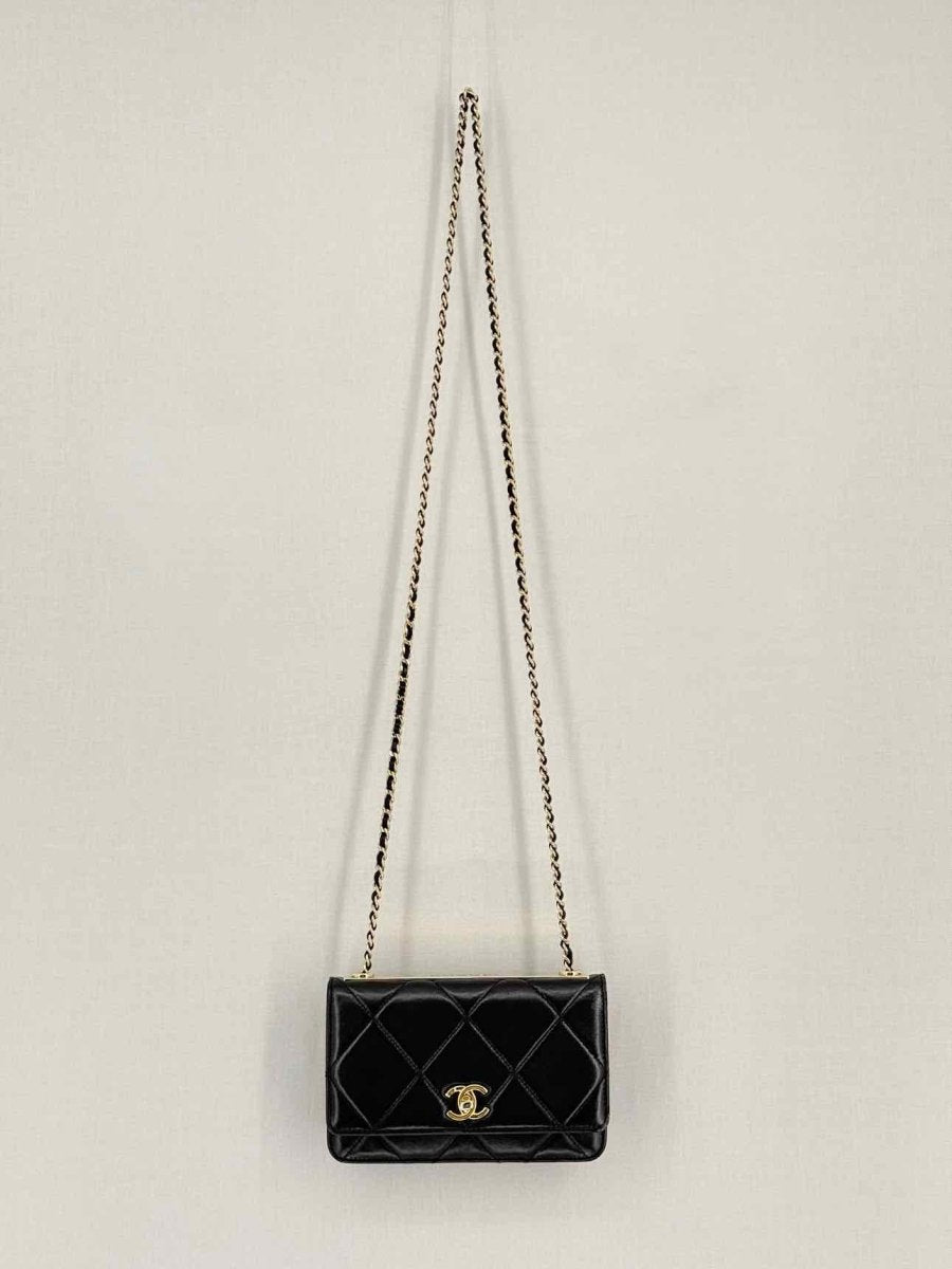 Pre-loved CHANEL Trendy CC WOC Black Quilted Shoulder Bag at Reems Closet