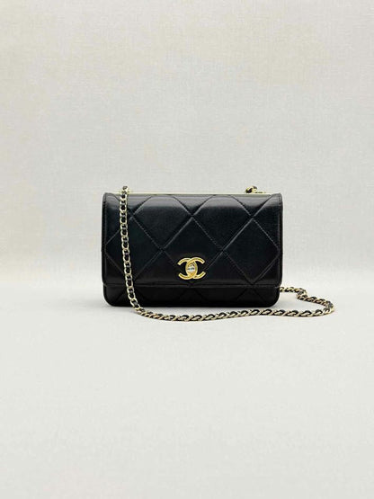 Pre-loved CHANEL Trendy CC WOC Black Quilted Shoulder Bag at Reems Closet