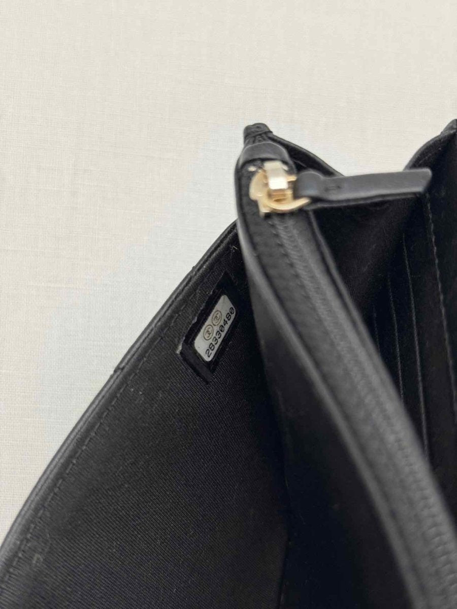 Pre-loved CHANEL Trendy CC WOC Black Quilted Shoulder Bag at Reems Closet