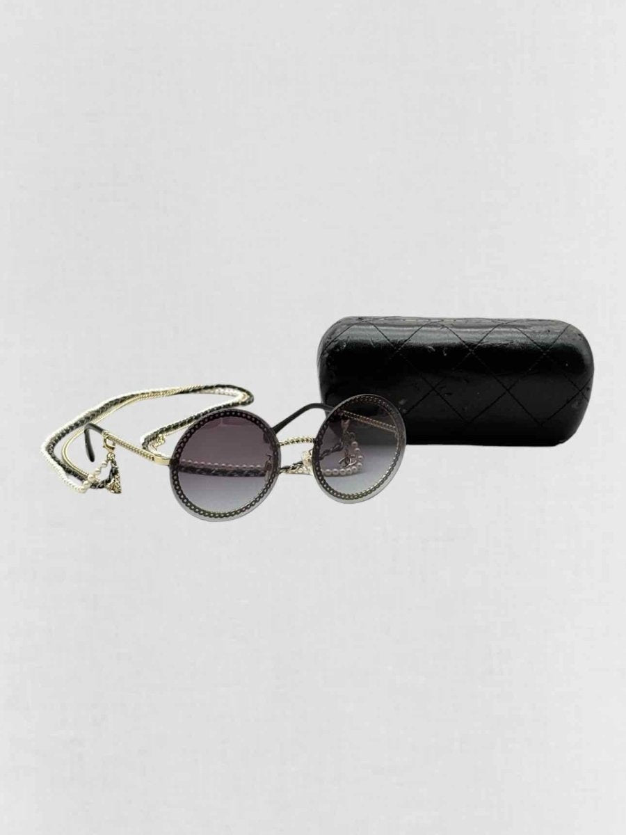 Pre - loved CHANEL Trio of Chains Black Sunglasses at Reems Closet