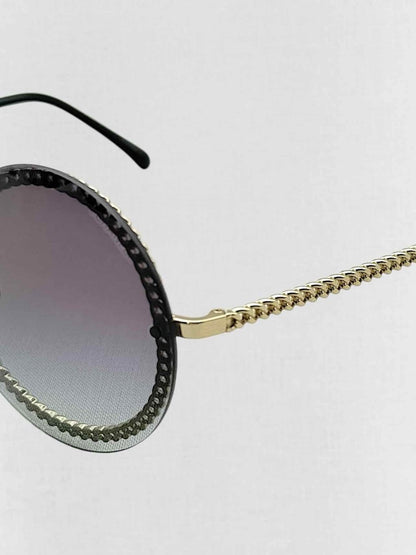 Pre - loved CHANEL Trio of Chains Black Sunglasses at Reems Closet