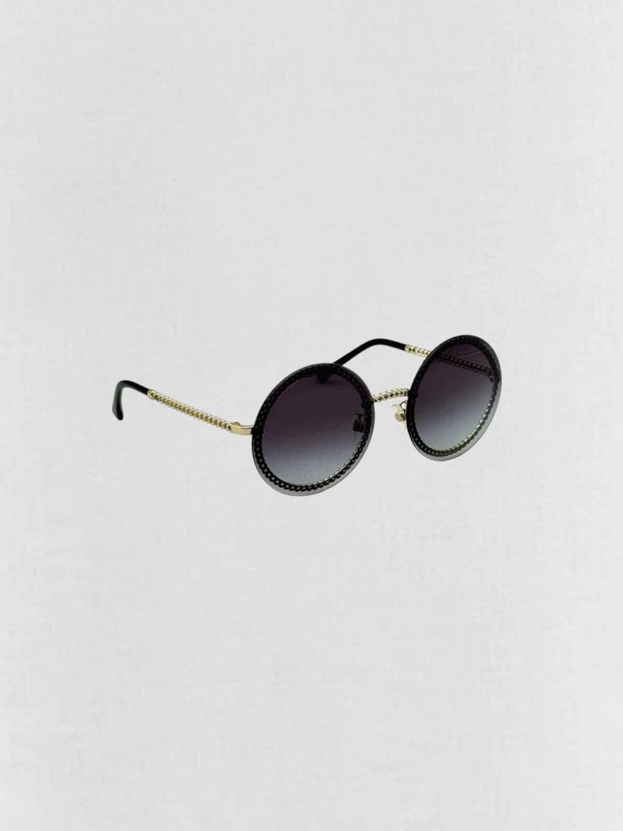 Pre - loved CHANEL Trio of Chains Black Sunglasses at Reems Closet