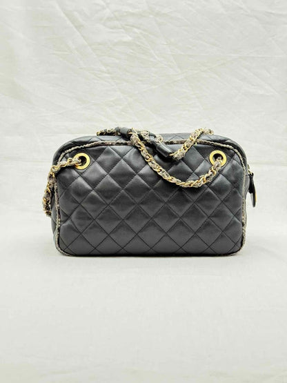 Pre - loved CHANEL Tweedy Bowler Black Quilted Shoulder Bag at Reems Closet