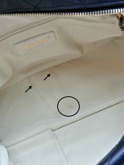 Pre - loved CHANEL Tweedy Bowler Black Quilted Shoulder Bag at Reems Closet